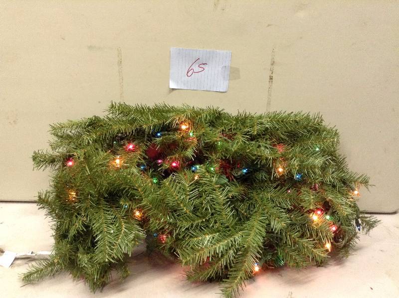 lot 65 image: National Tree Co. Norwood Fir Pre-Lit Garland Never used 9 actual stock photos used to display item