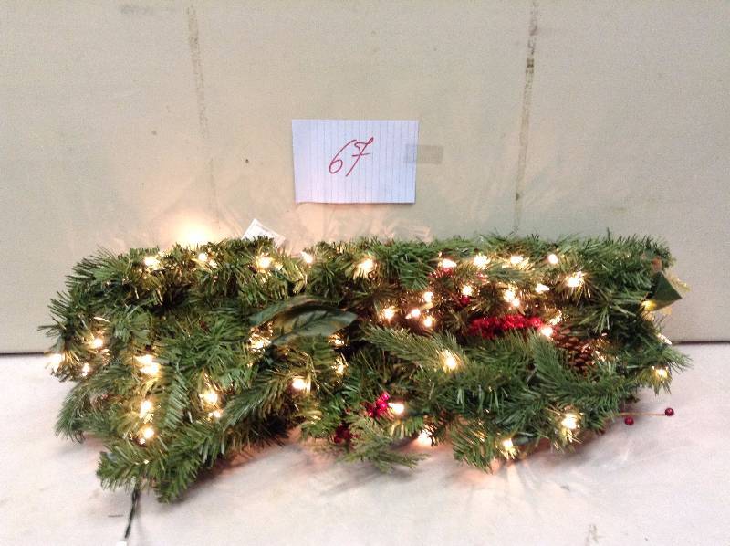 lot 67 image: Martha Stewart 9 FT Winslow Artificial Garland with 100 Lights actual and stock photos used to display item