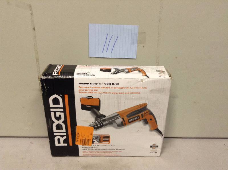 lot 111 image: Ridgid 8-Amp 12 in. Heavy-Duty Variable Speed Reversible Drill in like new condition