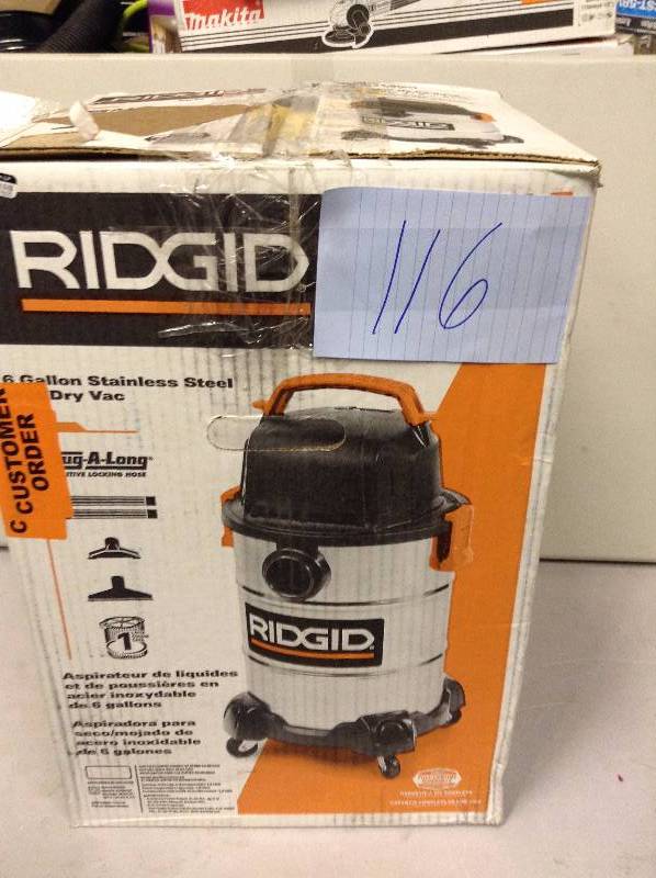 lot 116 image: Ridgid  6 Gal Stainless Steel WetDry Vac never used