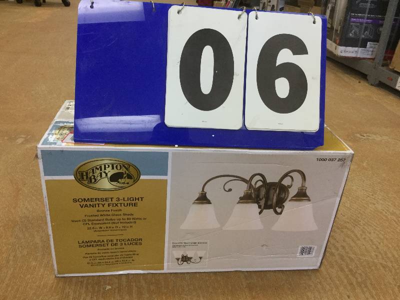 lot 6 image: Hampton Bay Somerset 3-Light Bronze Vanity Light open box stock and actual photos used to display item