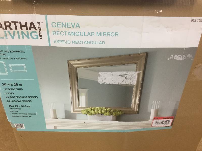 lot 34 image: Martha Stewart Living Geneva 36 in. x 30 in. Polished Pewter Framed Mirror stock and actual photos used to display item