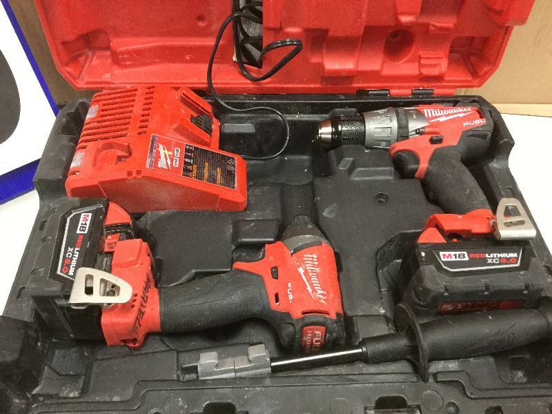 lot 140 image: Milaukee Fuel M18 hammer Drill and Impact Driver Kit used in very condition