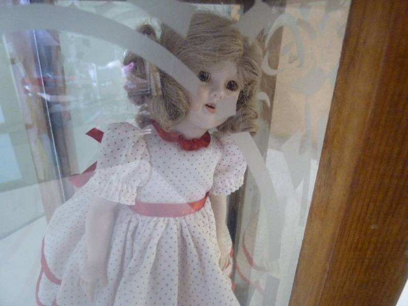lot 87 image: Collectible Doll