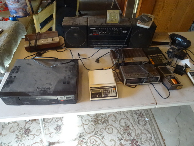 lot 122 image: Misc Electronics, Tires, Clock Radios
