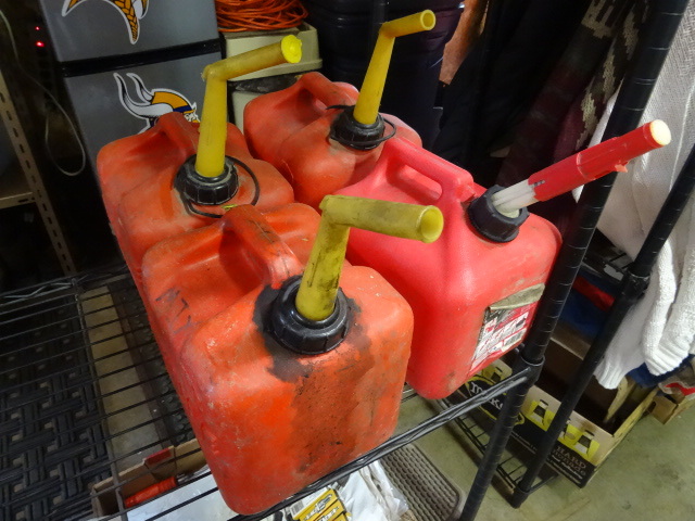 lot 80 image: 4 Plastic Gas Cans. 2 Gal.