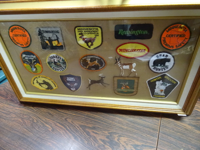 lot 312 image: Framed Hunters Patches