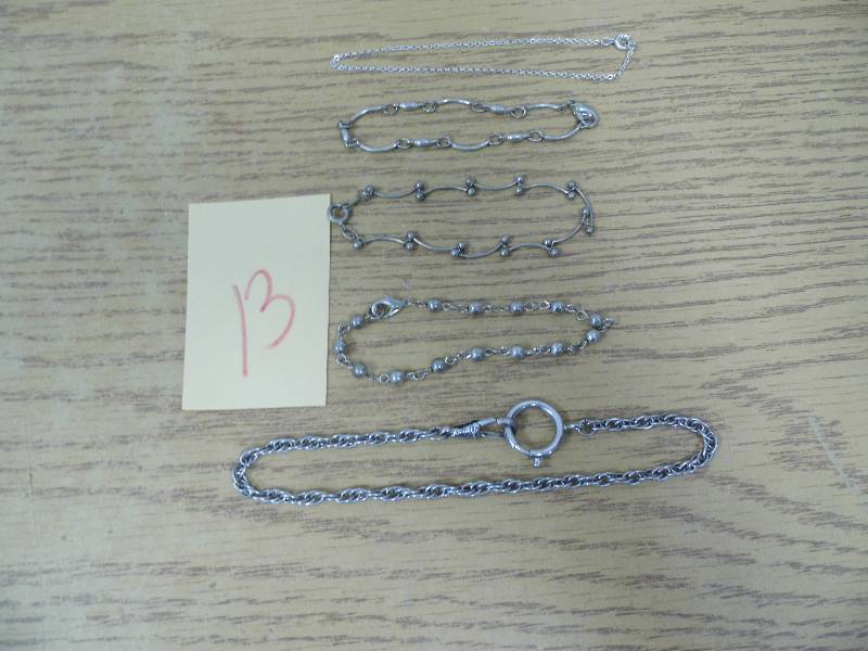 lot 13 image: Silver Colored Bracelets
