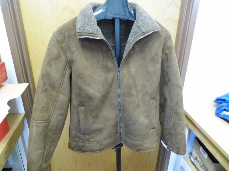 lot 57 image: New Brown Jacket