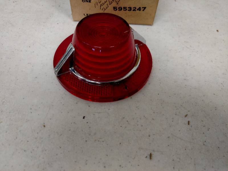 lot 81 image: 1962 Chev. Tail Light Lens, NOS...