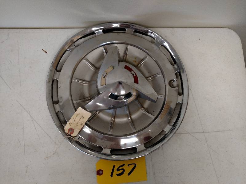 lot 157 image: 1962 Impala Spinner Wheel Cover...