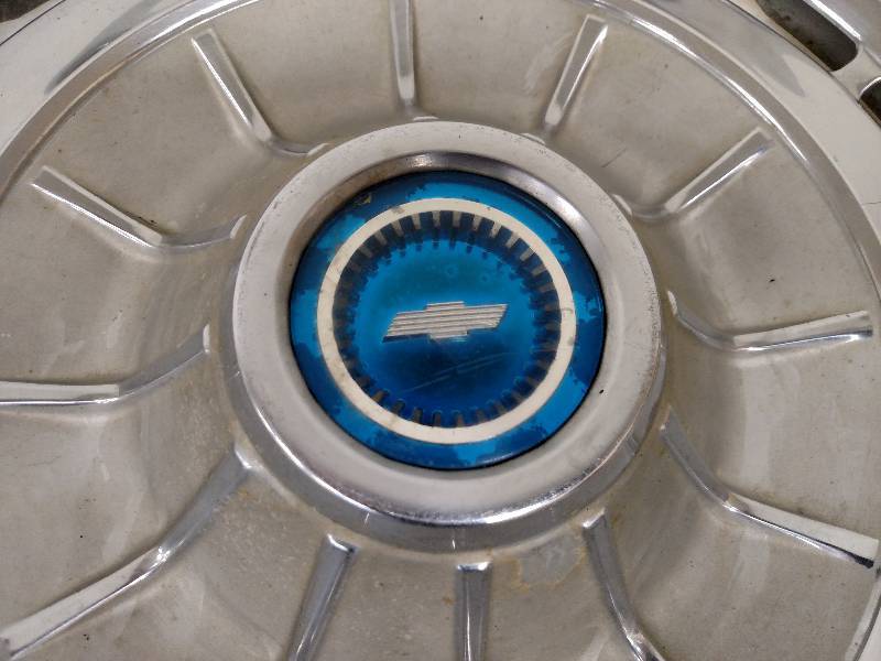 lot 359 image: (2) 62 Chev. Hub Caps...