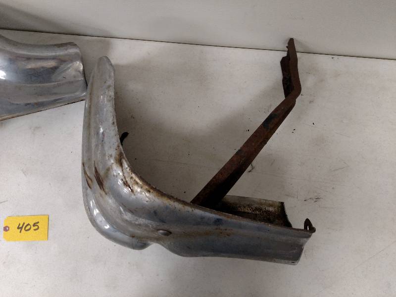 lot 405 image: Pair of 57 Chev. Front Bumper Ends...