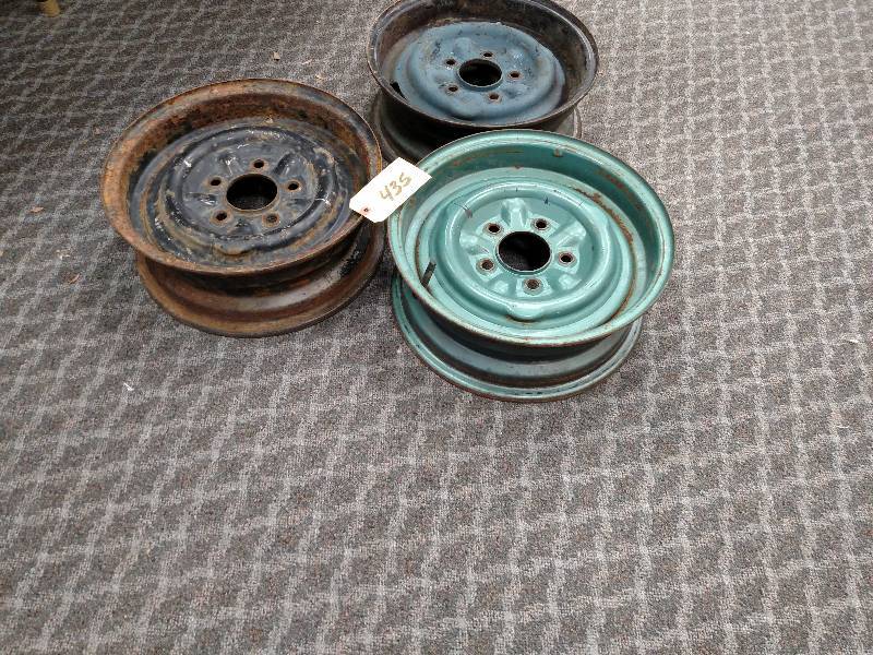 lot 435 image: (3) 57 Chev. Rims, 14 x 5...