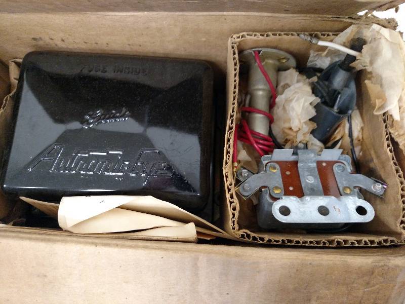 lot 477 image: 53 Chev. AutotronicEye Headlight Be...