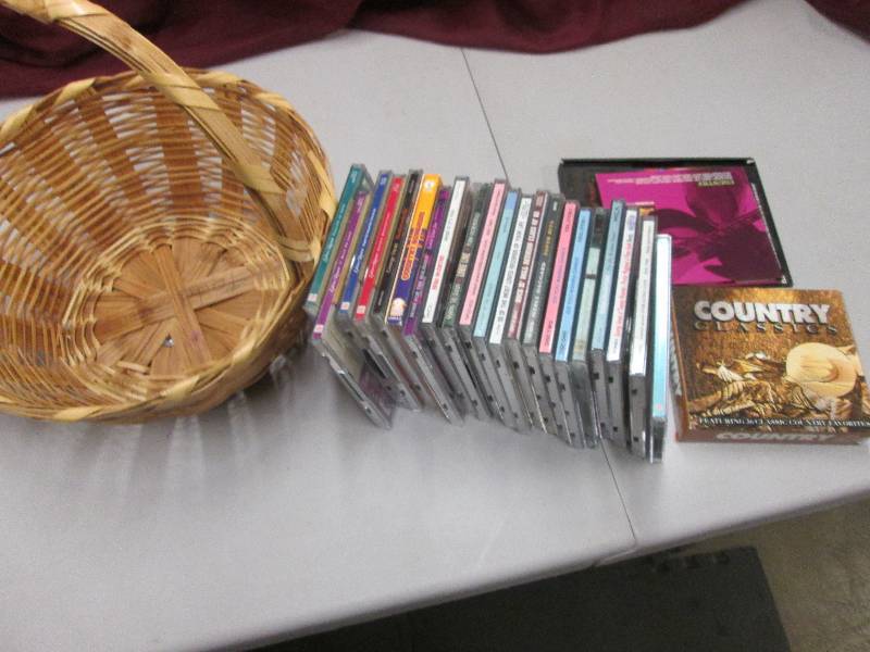 Lot of Assorted Musuc CDs in woven...