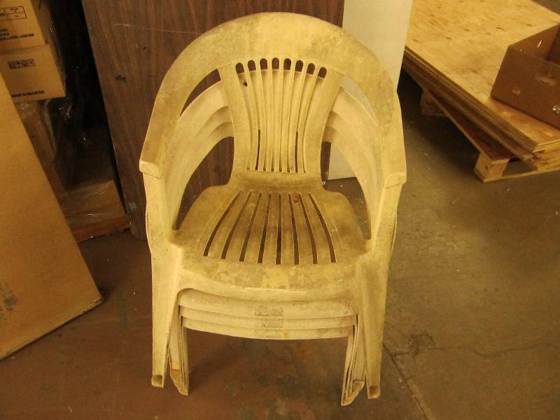4 plastic patio chairs...