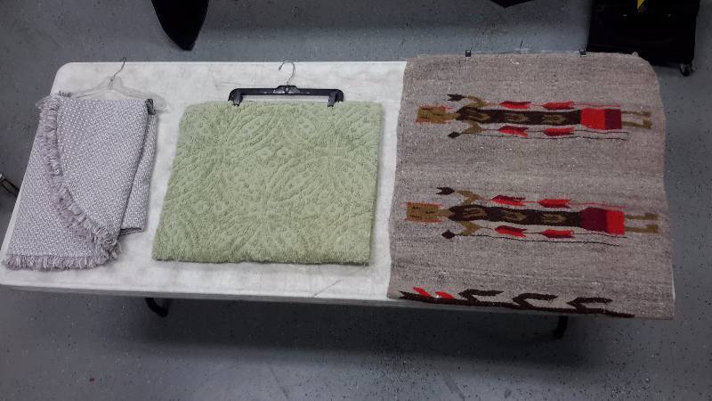 lot 5 image: Assorted rugs and pillowcases