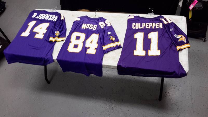 lot 31 image: 3 Vikings jerseys