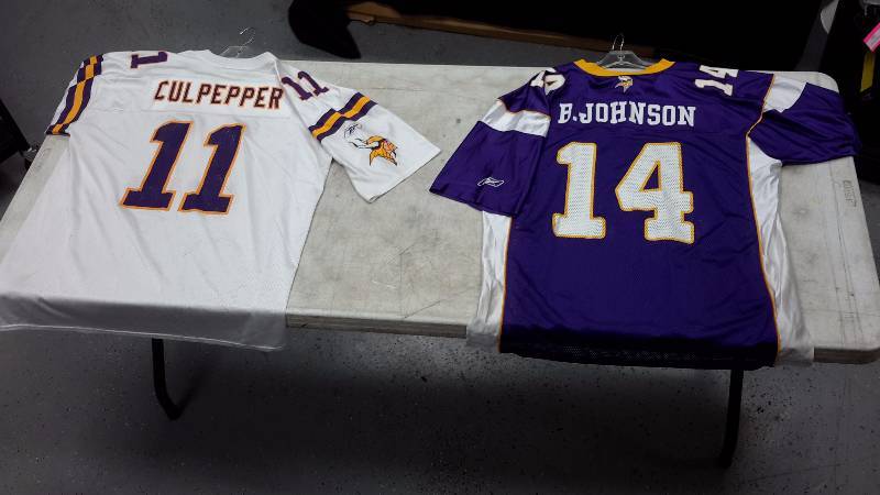 lot 35 image: Pair of Vikings jerseys