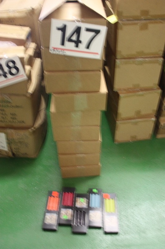 475 Packages of 4-pack tapered candles.