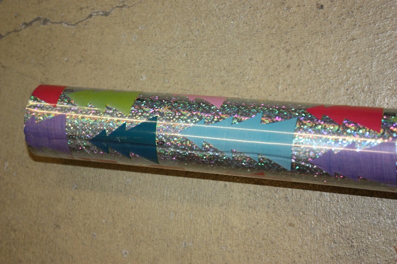 120 rolls of Holiday MYLAR gift wrap.  (39 tall x 100 foot rolls)    Original Retail $19.95 each.