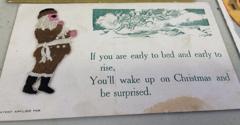 lot 55 image: Antique Santa Christmas Postcards
