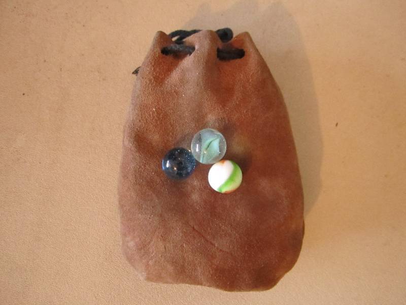 lot 24 image: Satchel of marbles...
