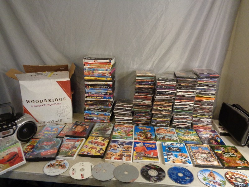 lot 146 image: Huge Lot of Cds, DVDs, and More