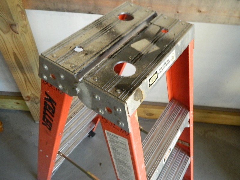 lot 12 image: 4 Ft Double Sided Step Ladder