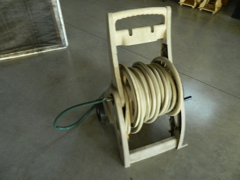 lot 194 image: Garden Hose on Hose Reel
