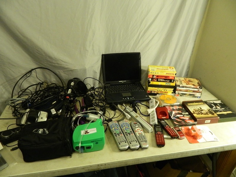 lot 149 image: Dvds, Laptop, and More