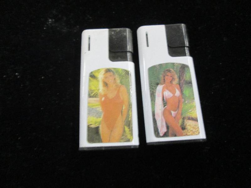 2 lighters never been used ...