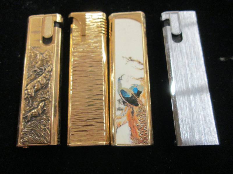 4 lighters never been used retail i...