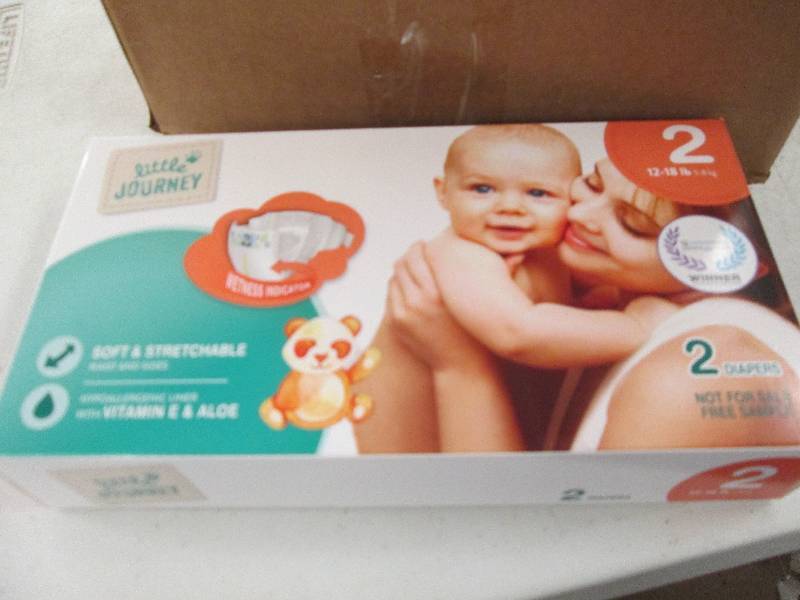 1 box of diapers 21 packages of siz...