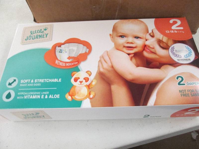 1 box of diapers 21 packages of siz...