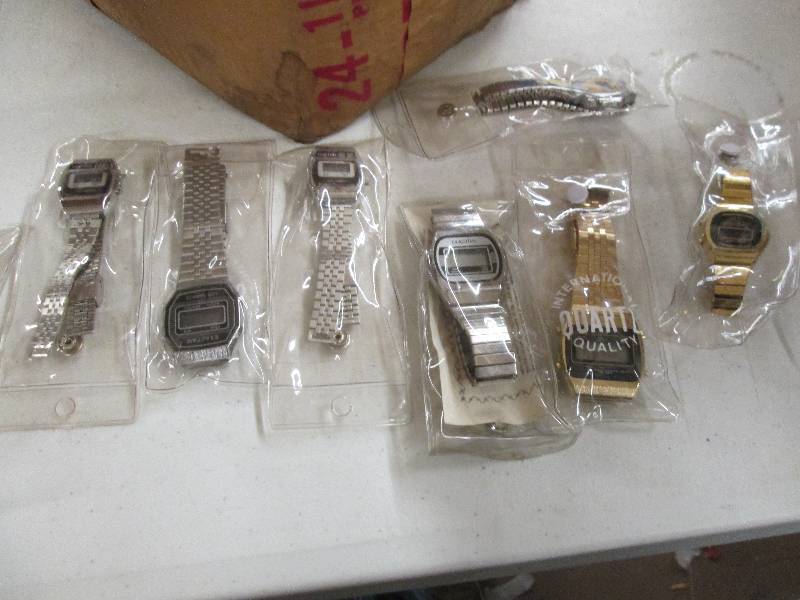 box of watches with lcd screens  ...