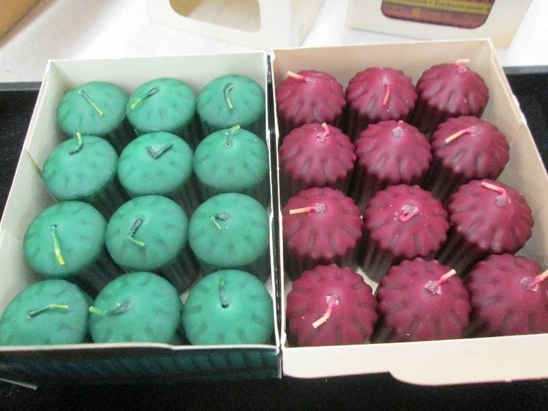 4 boxes of candles 2 boxes of green...