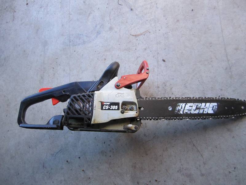 lot 52 image: Echo chainsaw...