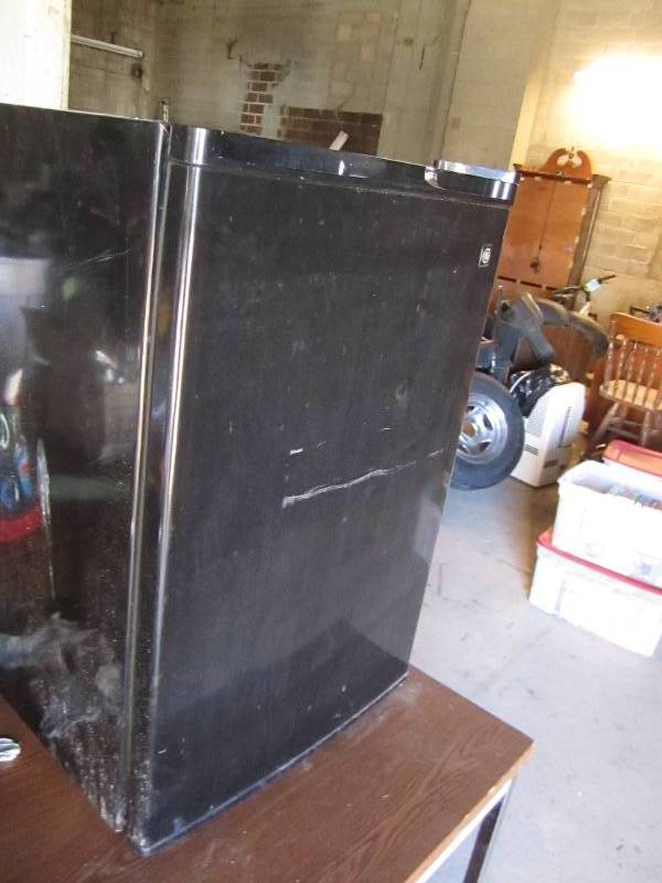 lot 65 image: Black mini refrigerator...