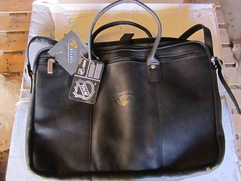 lot 66 image: New Minnesota Wild stamped bag...