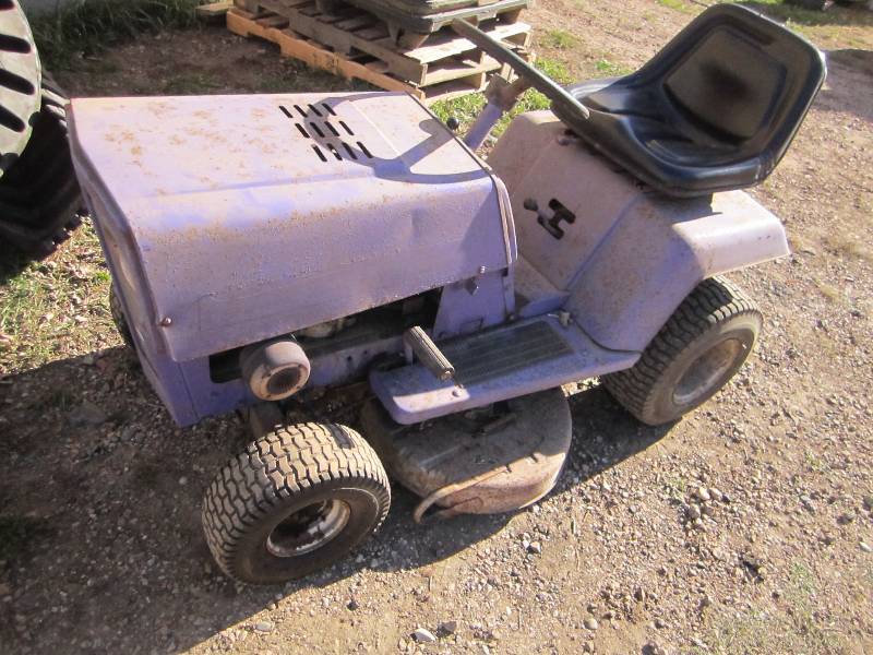 lot 7 image: Older model lawn mower, with newer ...