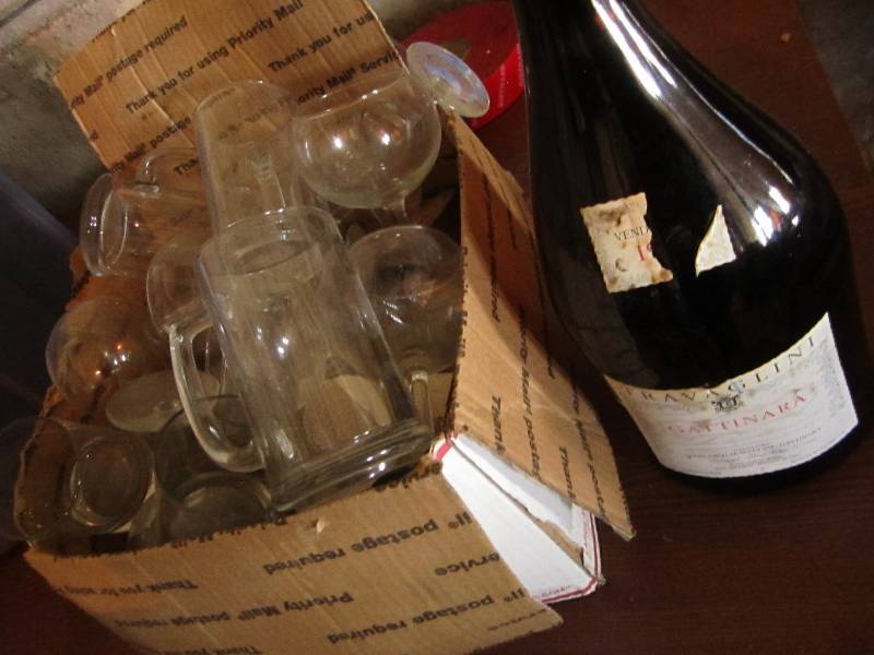 lot 94 image: Wine glasses and vintage wine bottl...