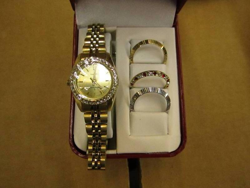 lot 141 image: Watch with changeable faces...