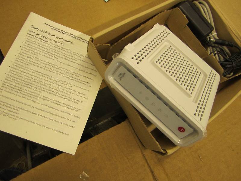 lot 154 image: Motorola cable modem...