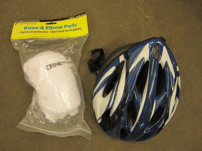 lot 159 image: Bike helmet and knee pads...