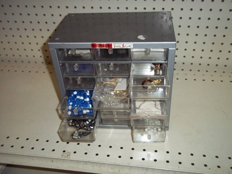 Parts bin with jewelry