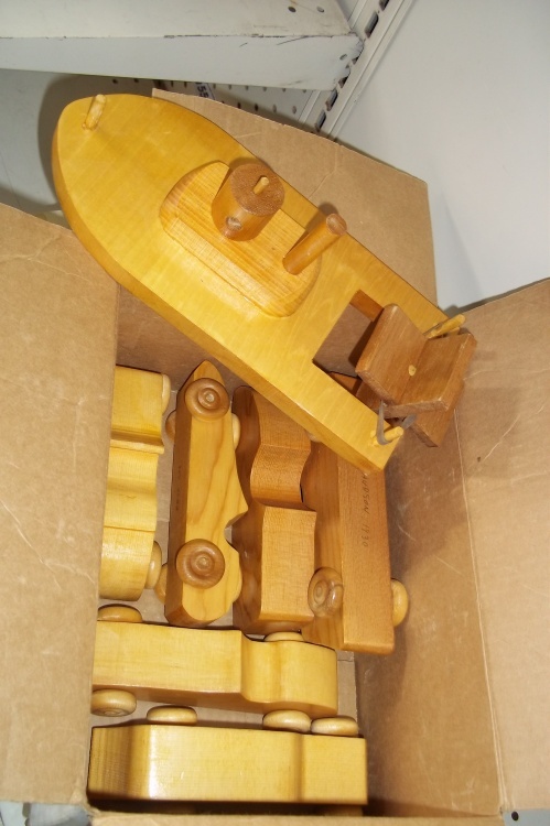 Toy wood boat and cars