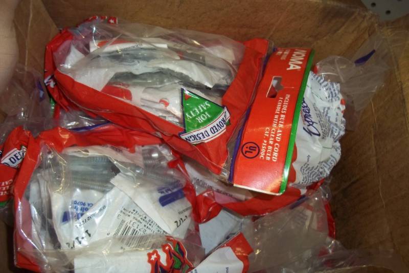 Large box of Screws in small packages