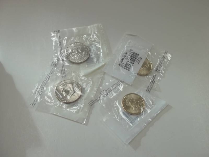Complete 2003 Uncirculated Kennedy half and Sacagawea Dollar set